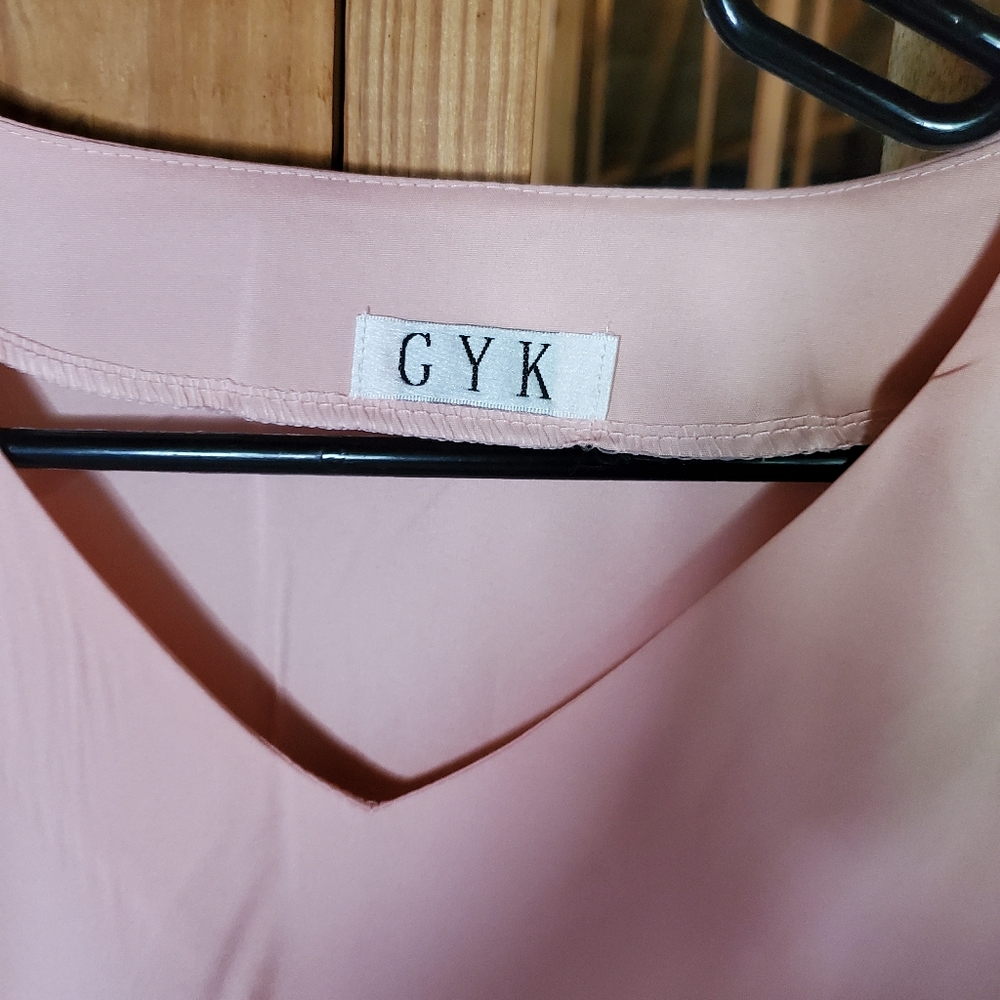 Beautiful pink blouse with cutout on arms